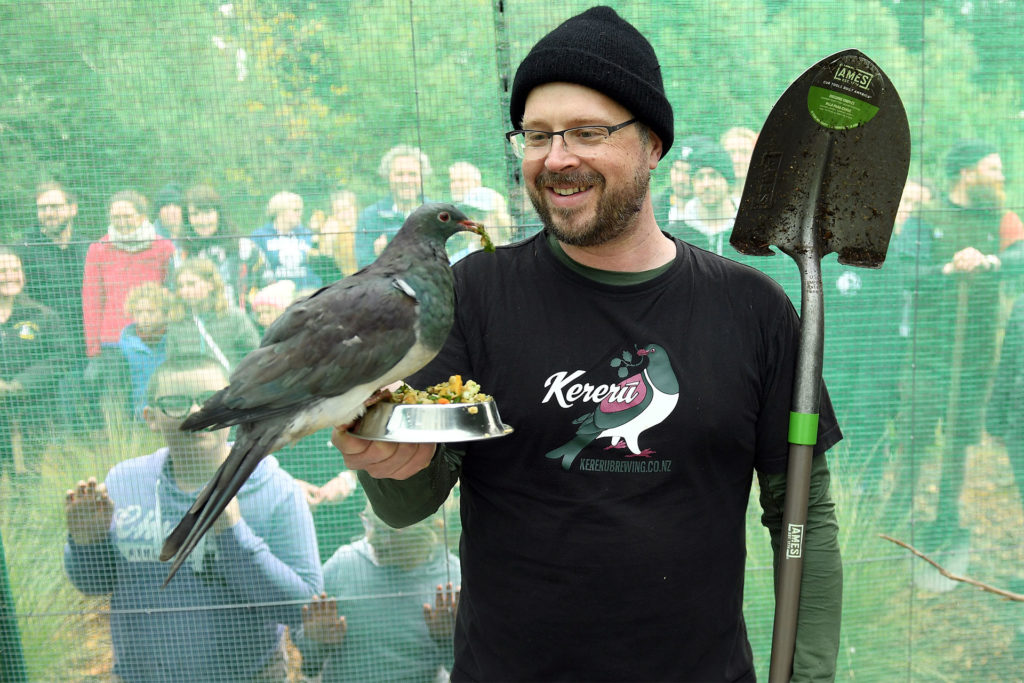 Chris Mills with the Kereru bird